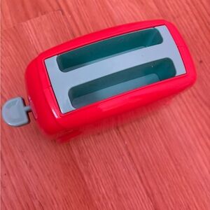 Red and Gray Toy Toaster